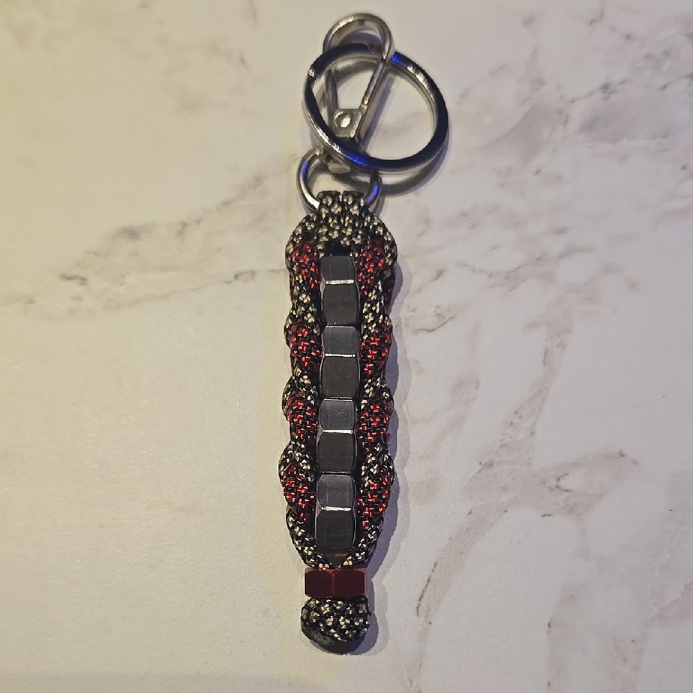 Red and Black , Gold and Black Diamond Paracord Hexnut Keychain.